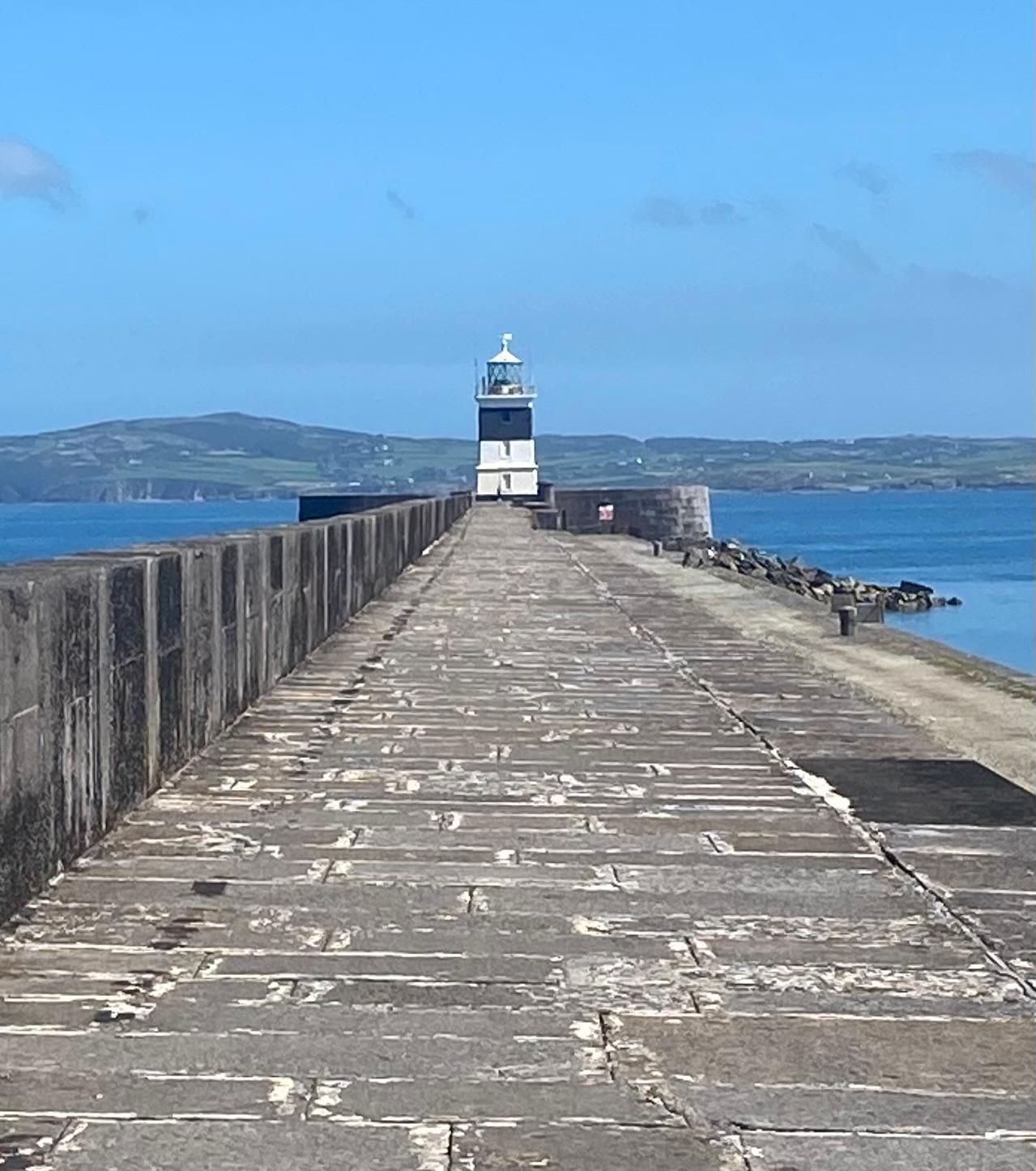 Lighthouse breakwater sea